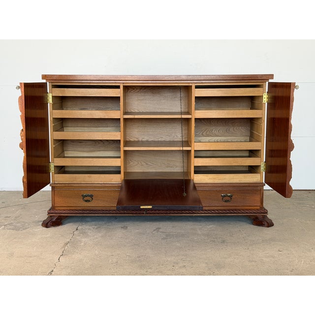 A certified masterpiece of mid-century Danish folk art and monumental woodcarving, this extraordinary cabinet is a literal...