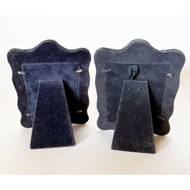 A Beautiful pair of matching English Sterling Silver Repousse Picture Photo Frames. (Please note: One frame has English...