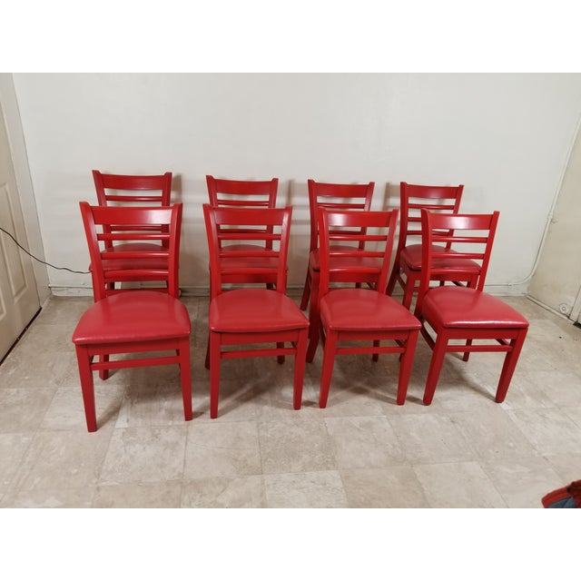 Set of eight dining chairs made out of solid maple wood Circa 1980 fully restored , painted in a fire red color ,...
