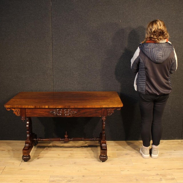 Antique Welsh writing desk from the mid-19th century. This high-quality furniture is finely carved and veneered in...