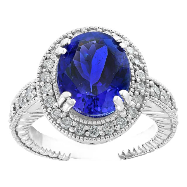6 Carat Oval Tanzanite and 1 Carat Diamond Ring 14 Karat White Gold, Estate For Sale