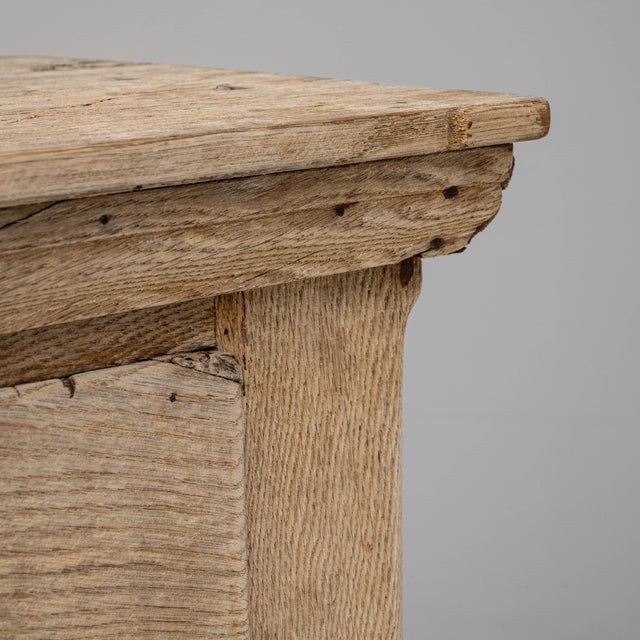 This 19th Century German oak buffet is a beautifully restrained example of rural craftsmanship, defined by its simple...