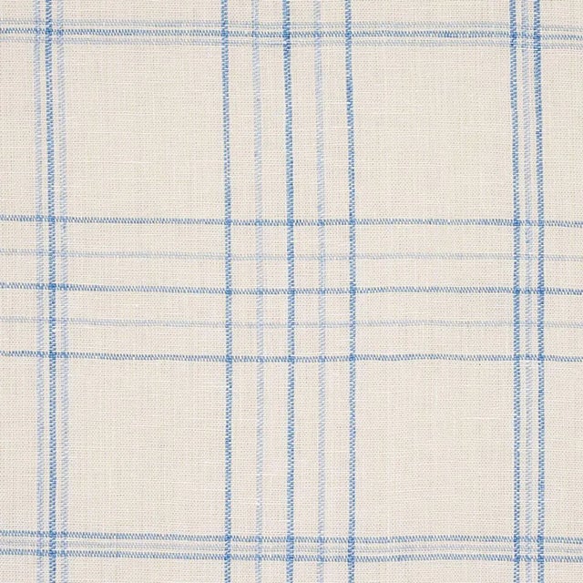 Pared down and pretty, Nils Plaid is one of the most versatile fabrics. This linen plaid has a performance finish with a...