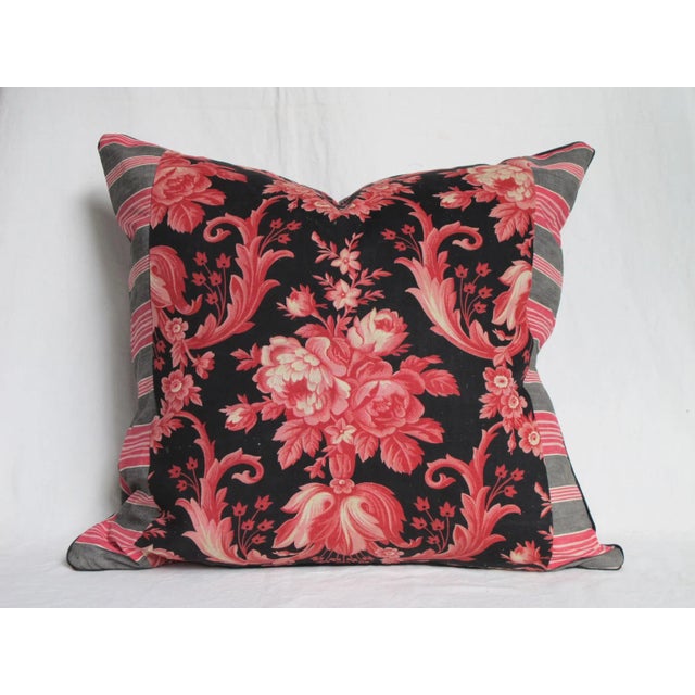 A pillow made from a circa 1880's French printed cotton, backed with French antique ticking stripe, down insert is included