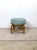 Low, round, and effortlessly relaxed, this vintage rattan ottoman is a quintessential piece of the coastal aesthetic that...