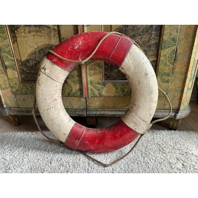 This authentic 20th-century German lifebuoy is a rare maritime artifact with exceptional decorative appeal. The piece...