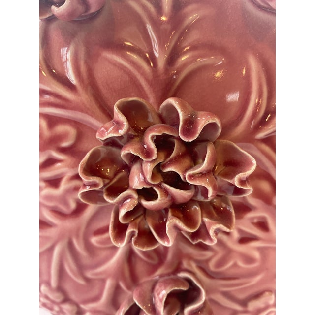 A stunning hand crafted large vase or jug. Pink porcelain with hand sculpted flowers on both sides.