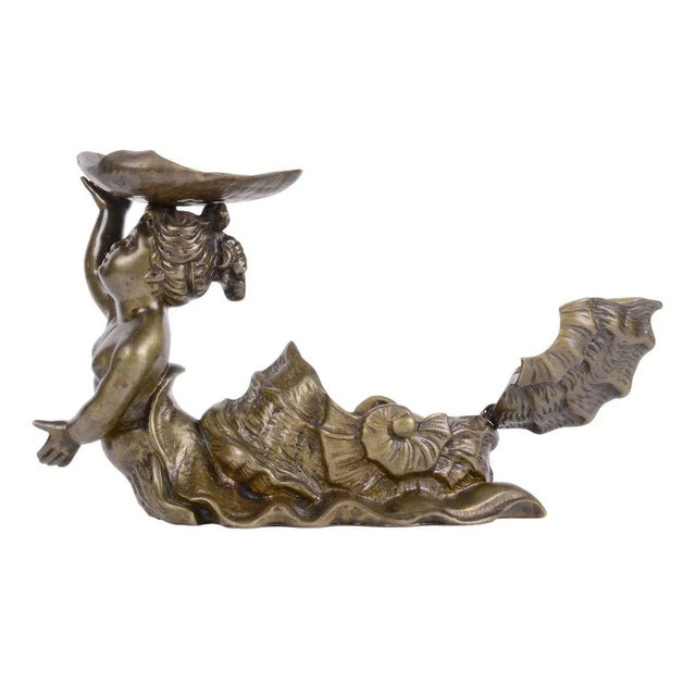 Antique fantasy nude snail maiden bronze inkwell holder, circa early 20th century. This unsigned bronze piece shows a nude...