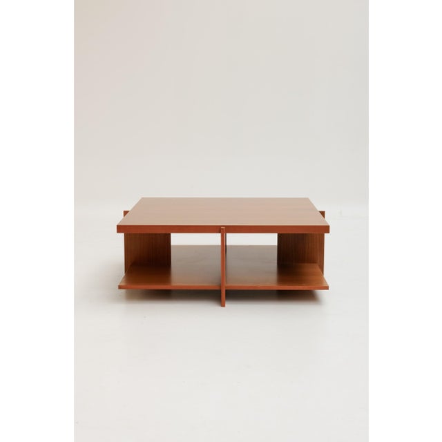 Square coffee table designed by Frank Lloyd Wright and produced by Cassina. Made of wood veneer, it is distinguished by...