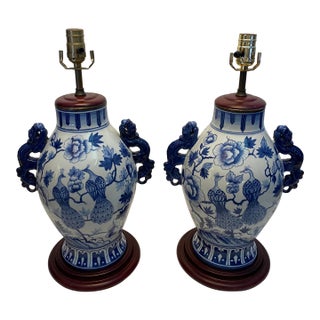 Pair of Blue and White Chinoiserie Porcelain Urn Table Lamps With Peacock Motif For Sale