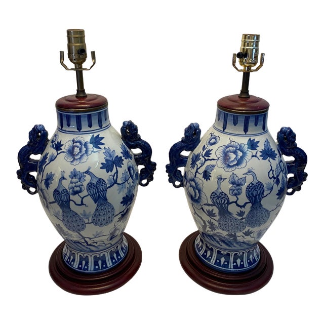 Pair of Blue and White Chinoiserie Porcelain Urn Table Lamps With Peacock Motif For Sale