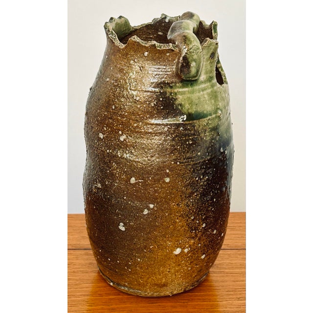 MCM Japanese ceramic vase in the wabi sabi style. Great for organic ikebana designs with the top opening and the lower...