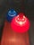 Two Minisol pendant lights in blue and red. The Minisol is a small pendulum that was made entirely of plastic and came in...