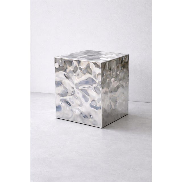 Aura Sculptural Metal Pedestal by Veliento. Dimensions: 40 x 40 x 50 cm Materials: Hand textured Metal. Veliento is a...