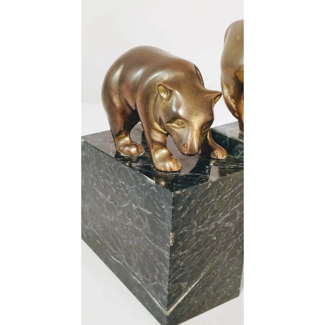 Vintage Brass Bookend PAIR!! These are simply stunning. Designed beautifully on green marble is a statue of brass bull and...