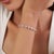This elegant tennis bracelet features 2.74 carats of pink sapphires, set in 14k white gold. Each sapphire measuring 4 x 3...