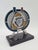 An original, vintage demonstration model illustrating the operating principle of a rotary engine, specifically a Wankel...