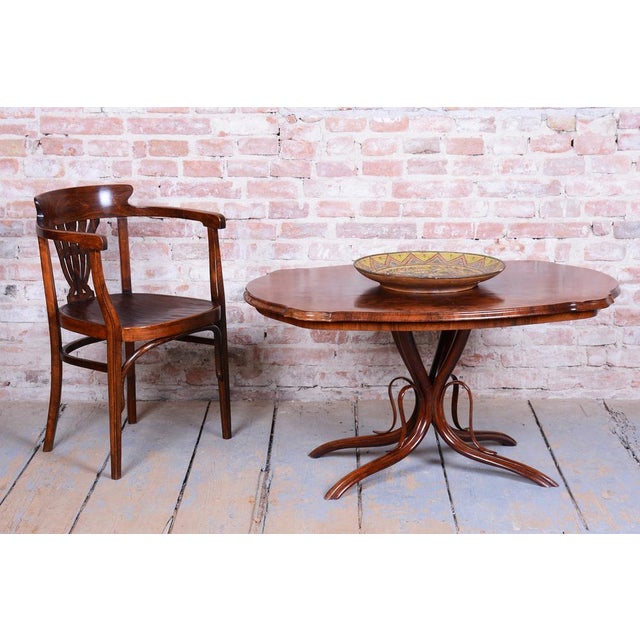 This elegant coffee table in the Historicism style originates from Bohemia from the late 19th century. It is crafted from...