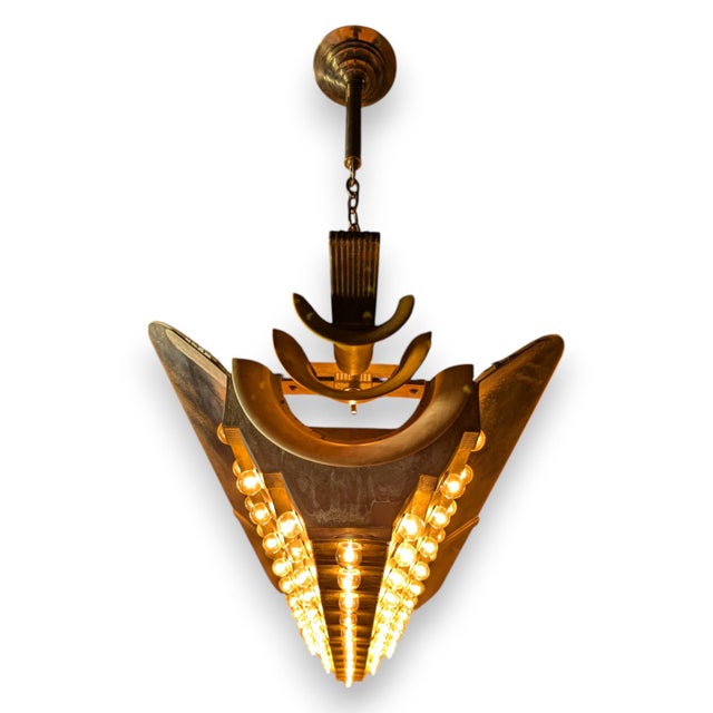 Hollywood meets steampunk in this fun verdigris copper and mirror ceiling fixture on a galvanized steel frame. Is it a...