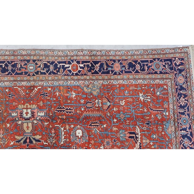 This room size Antique Serapi Circa 1920 rug is notable for the trul compelling colors throughout the field it is a...