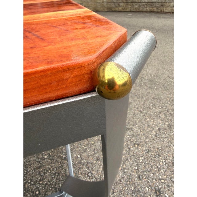 Rich cherry wood meets sculptural metalwork in this one-of-a-kind, artisan-crafted side table. A newly made solid cherry...