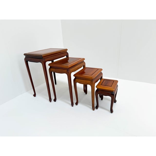 This is a beautiful vintage set of 4 nesting tables made of solid wood. The tables fit perfectly under each other, saving...