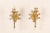 A pair of French single-light, forged-iron sconces in gold tone from the mid 20th century. This pair of vintage hand-...