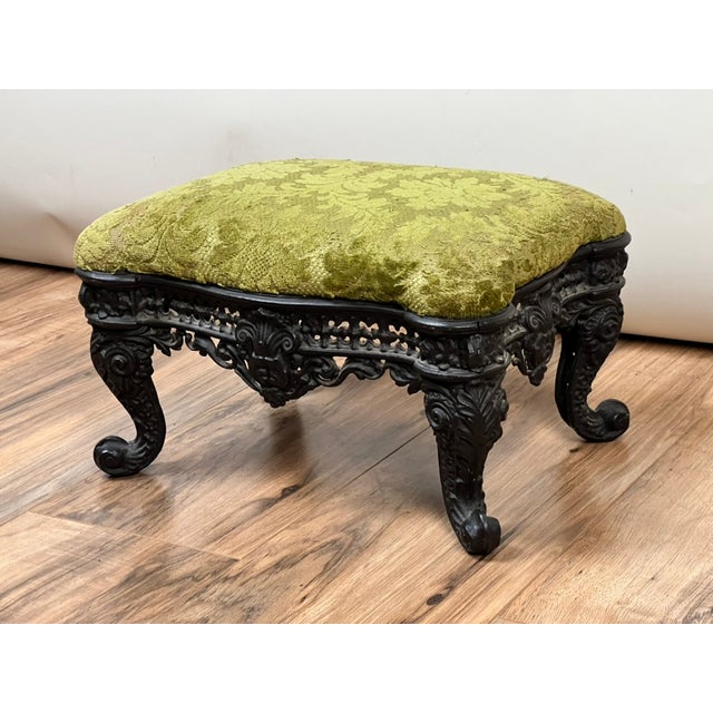 This richly detailed antique Victorian foot stool is a wonderful example of the ornate decorative arts that defined the...