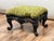 This richly detailed antique Victorian foot stool is a wonderful example of the ornate decorative arts that defined the...
