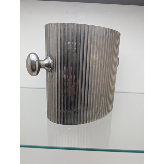 Rare Art Deco champagne/wine cooler in an oval shape, with fully vertical fluting, very high-quality workmanship, classic...