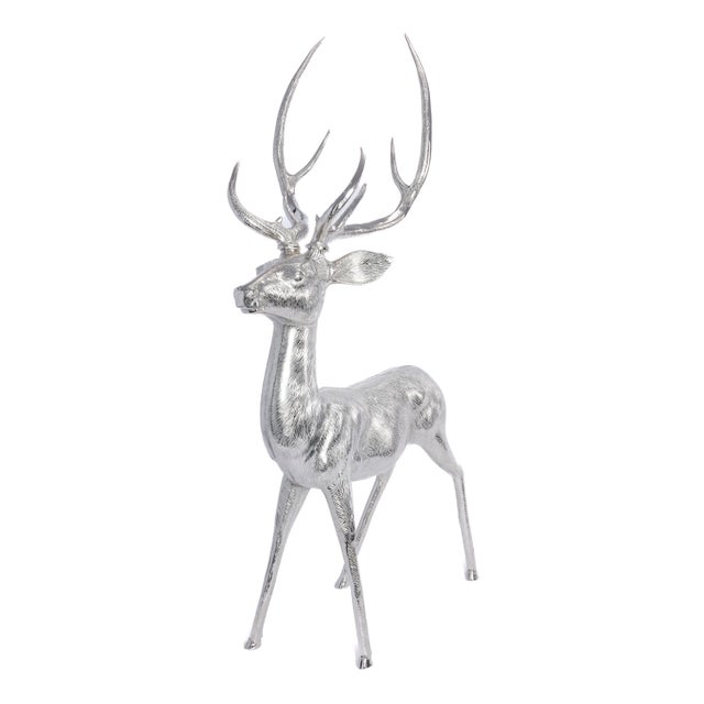 Elevate your holiday décor with the Corviglia Standing Aluminum Metal Deer Sculpture, a striking statement piece that...