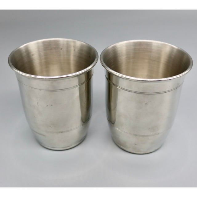 A matched pair of Salisbury Pewter "Chesapeake Bay Cup" julep cups from the Waterfowl Edition, handcrafted fine pewter...