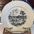 A refined Wedgwood transferware plate capturing the historic St. Louis riverfront—an elegant expression of American...