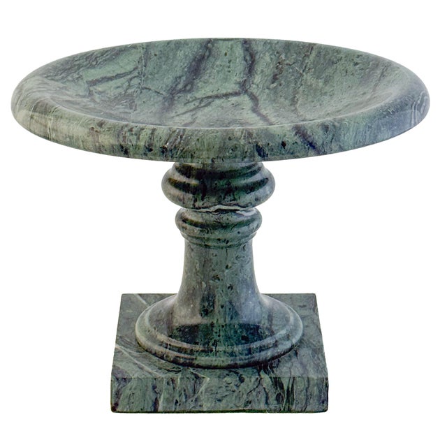 A fine Italian tazza centerpiece or pedestal bowl of figured green marble from the 19th century, featuring a Neoclassical...