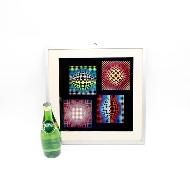 Print by renowned artist Victor Vasarely, a leading pioneer of Op Art. The composition is structured around four geometric...