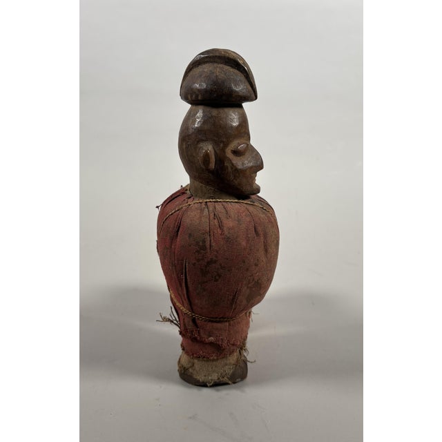 Mpwau Reliquary Statuette, Teke, Republic of Congo This Matomba figurine is used to treat sleeping sickness. It carries a...