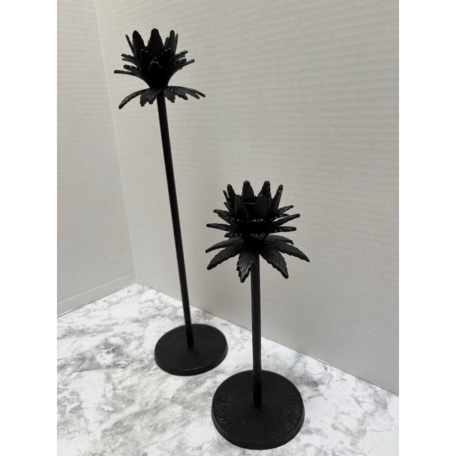 Vintage black metal palm tree candleholders- set of two. One shorter and one taller. These have been altered from original...
