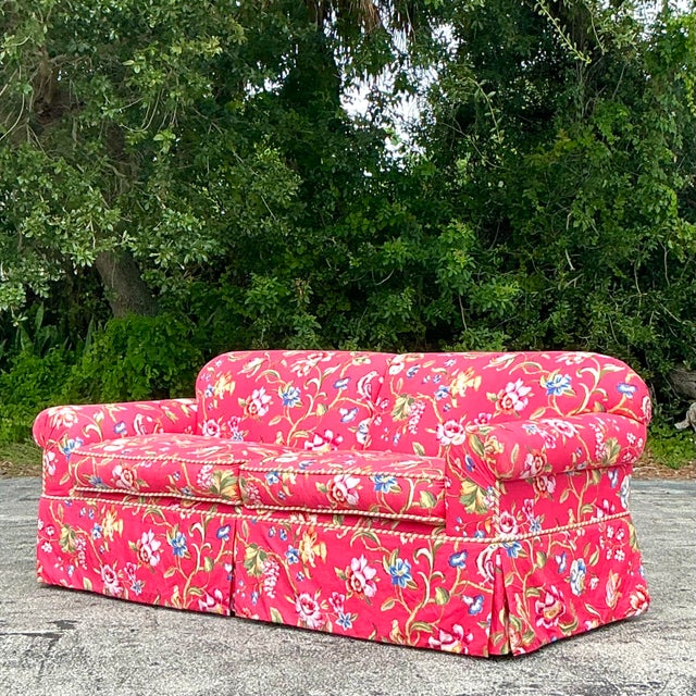 Luxurious Vintage Regency roll arm sofa upholstered in Brunschwig & Fils "Fiesta de Flores" fabric, featuring vibrant...