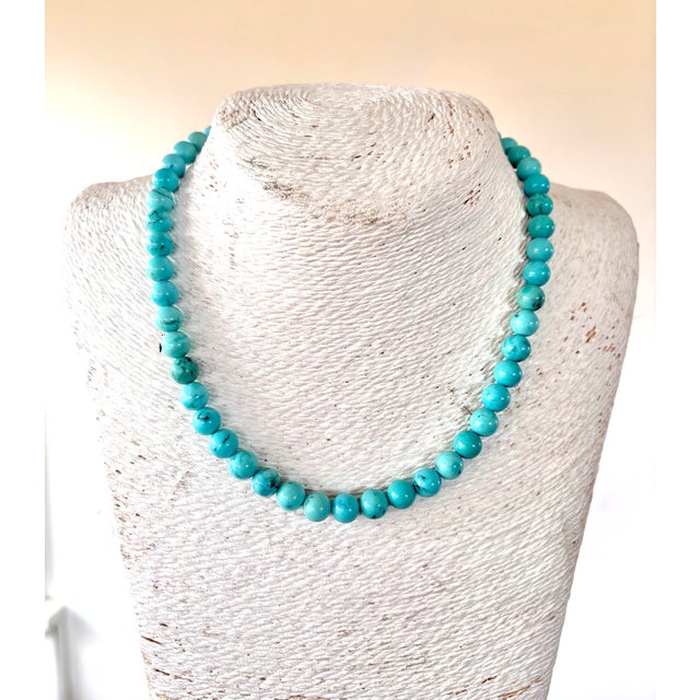 Lovely turquoise fitted stone necklace with 4mm beads and silver plated clasp.17” long