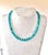 Lovely turquoise fitted stone necklace with 4mm beads and silver plated clasp.17” long