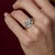 This elegant Mid Century diamond ring is a striking example of 1950s sophistication, defined by balance, structure, and...