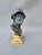 Bronze bust of Menelaus on gold bronze base.