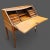 This 18th-century Louis XV Yellow Birch Bureau de Pente is an elegant piece, exquisitely crafted from solid wood and...
