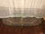 Gorgeous very large gilt wrought iron Hollywood Regency cocktail table. Styled after Gilbert Poillerat. This elegant long...