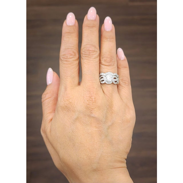 This gorgeous diamond engagement set is a timeless expression of elegance, beautifully crafted in 18k white gold....