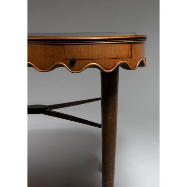 Rare square game table. Extremely detailed maple table with an hidden drawer opening on each side with movable ashtray