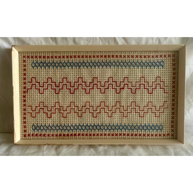 This Mid Twentieth Century Swedish embroidery sampler has a definite Americana vibe thanks to the graphic design and red,...