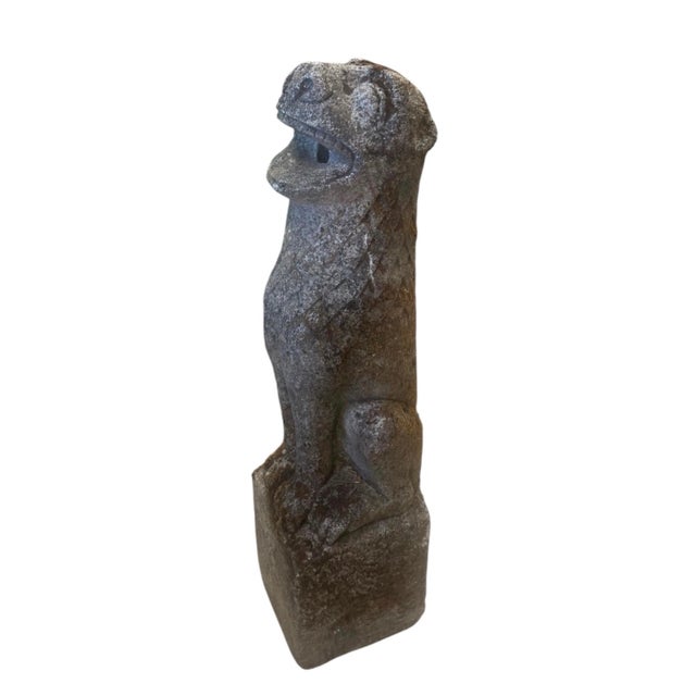 This unique garden architectural piece is a vintage cast stone wall fountain modeled in the shape of a sitting lion or...