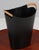 Finn Juhl & Grethe Kornerup-Bang paper bin in lacquered steel. Handles with cane. This piece is attributed to the...