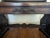 Excellent condition Italian walnut desk with ornate carvings and winged women carvings. Dimensions: 53.5" long x 40.5"...
